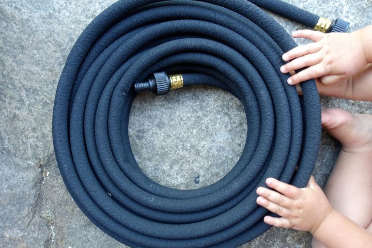 Watering with a soaker hose Sara's Kitchen Garden